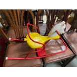 A Vintage child's rocking chair.