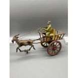 A Vintage Tinplate Clockwork two wheel cart drawn by a goat. Clockwork still appears to be working.
