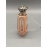 A Nice example of a ladies Facet cut glass perfume bottle with a white metal top. [8cm in length]