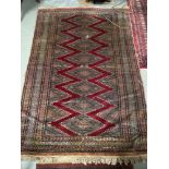 A Persian style rug.