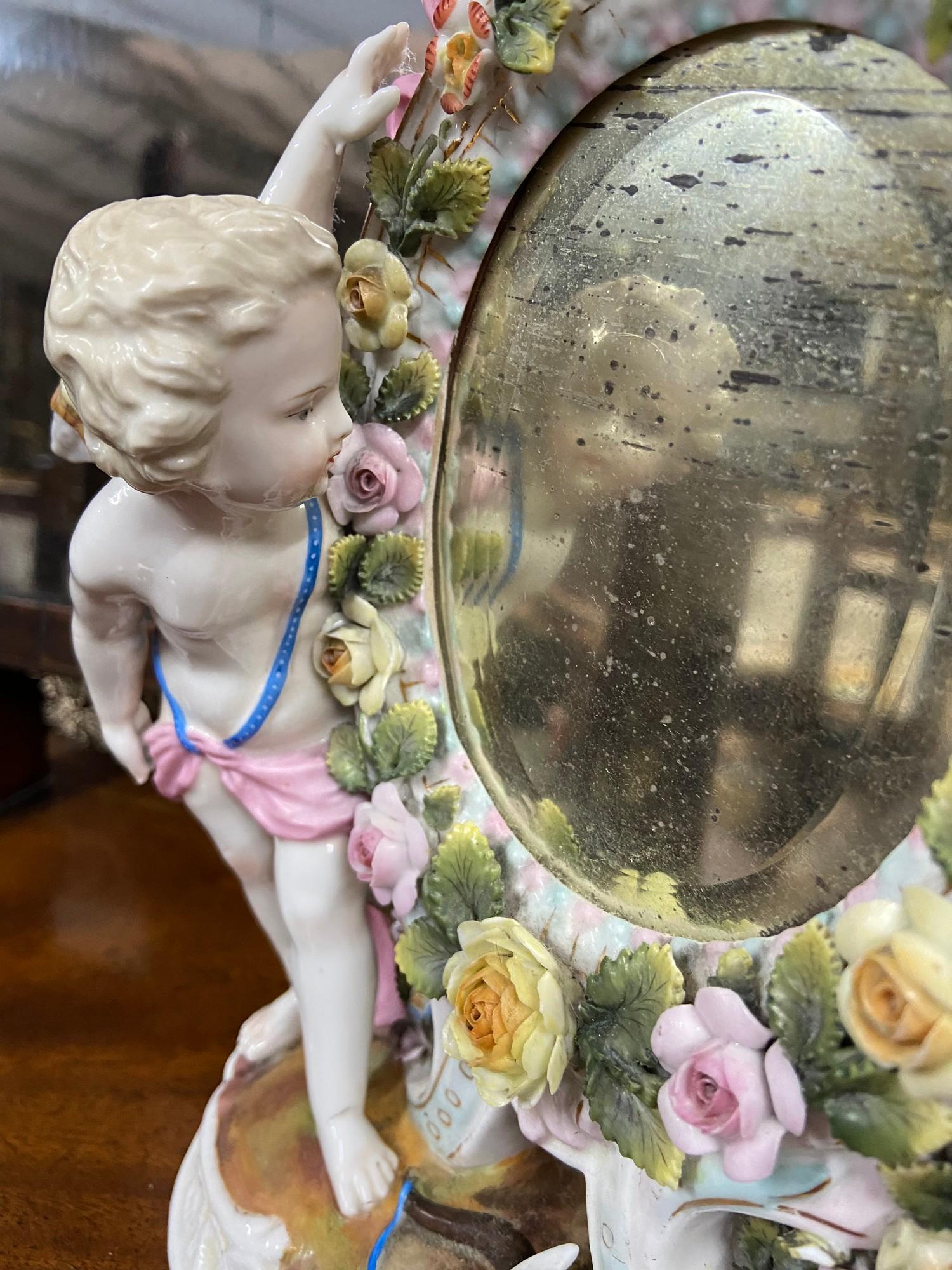 A 19th century Sitzendorf Cherub and floral design mirror. [ - Image 3 of 7