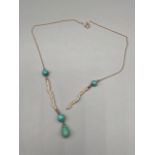 A Lovely gold, seed pearl and turquoise stone necklace. [Needs repaired][Tested for 9ct]