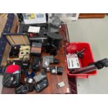 A Quantity of mixed cameras and cine cameras to include Canon, Kodak EK 200 and ExaCall III