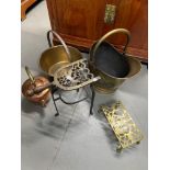 A Collection of various antique copper and brass wares. Includes Brass helmet design coal bucket,