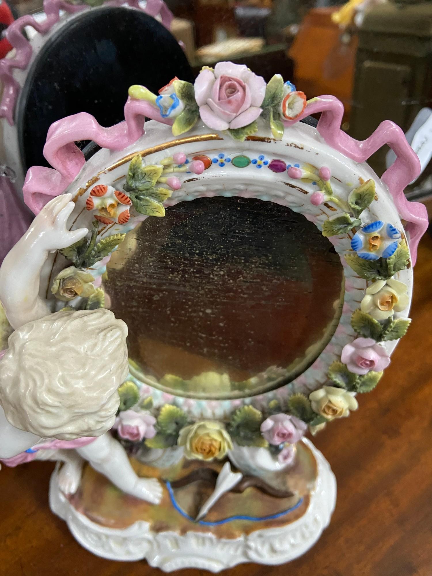 A 19th century Sitzendorf Cherub and floral design mirror. [ - Image 5 of 7