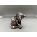 A Sheffield silver [Filled] cat figure playing with a ball of string. [5.5.cm in height]