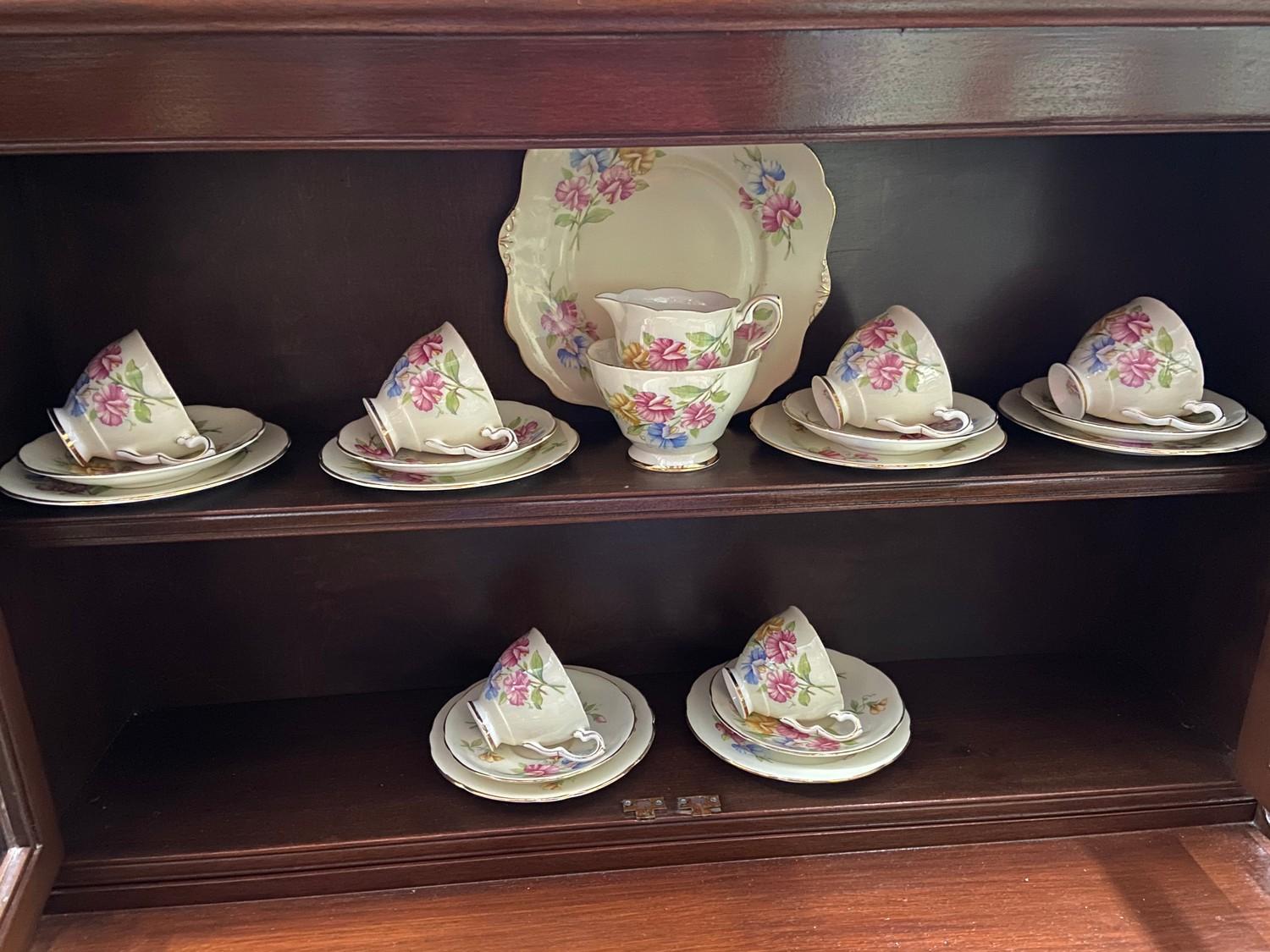 A Vintage 21 piece Royal Stafford tea set 'Sweetpea'