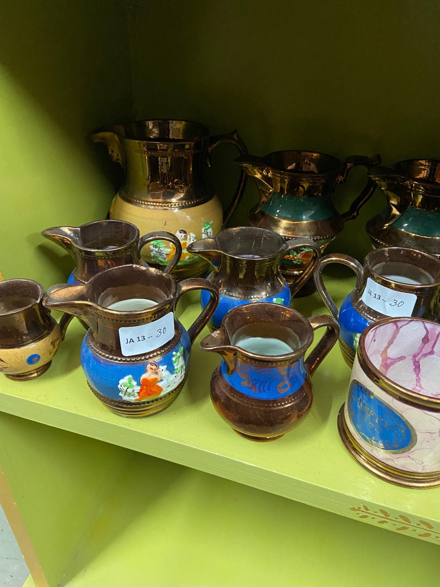 A Large quantity of Victorian lustre water jugs, creams and sugar bowls. - Image 4 of 4