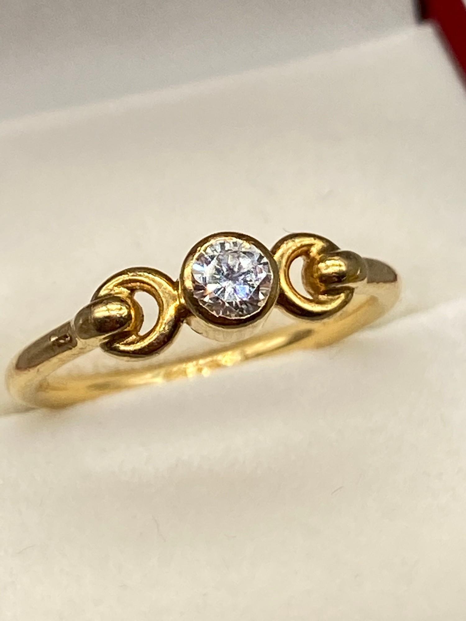 A Beautiful example of a ladies 18ct yellow gold single stone diamond ring. [0.20cts] [Ring size J]