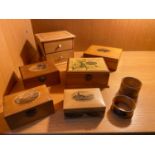 A Selecction of various Mauchline ware boxes and napkin rings.