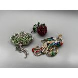 A Vintage Attwood & Sawyer peacock brooch, A Vintage 1950's Schreiner Ney York Rhinestone berry