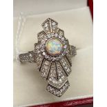 A Beautiful example of a ladies Silver, CZ and Opal panelled dress ring. In an Art Deco Form. [