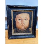 A 15th/16th century oil painting on wood of King Henry 8th. Fitted within a wooden and gilt