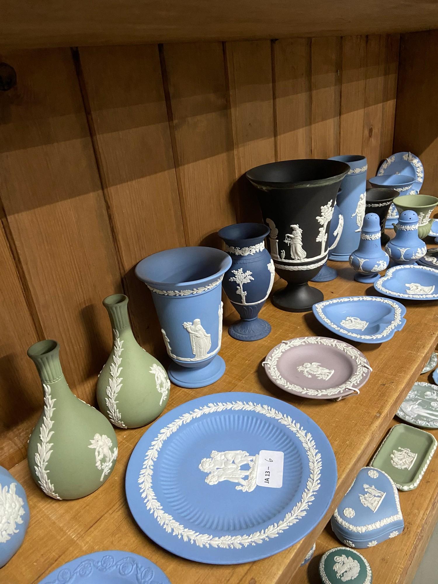 A Shelf of various Wedgwood Jasper ware vases, plates and cruets