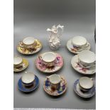 A Collection of Meissen pottery miniature cups and saucer & Meissen white glaze floral design ewer