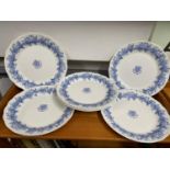 Seven 1989 Royal Doulton Eton College blue and white dinner plates.