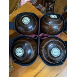 A Lot of four vintage wooden bowls produced by Geo. Mackay Edinburgh, with a carry case