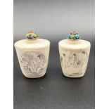 Two Chinese bone Snuff bottles, Designed with erotic scenes. Both lids are white metal with multi