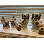 A Pair of Staffordshire wally dogs and a pair of Meissen style lady figurines