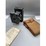 A Vintage Kodak Ball Bearing shutter camera. Comes with small scratch pencil and carry case.