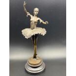 A Bronze figurine/ sculpture of a Ballerina sat upon a marble base. Signed Aldo Vitaleh. [31cm in