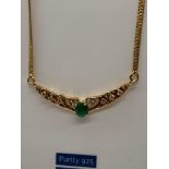 A Ladies 22ct gold Single Emerald and diamond pendant/ necklace. 0.24ct of diamonds. [11 grams] [