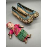 A Pair of 19th century Chinese Child's binding shoes. Together with a 19th century Chinese doll.