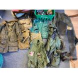 A Large collection of fishing clothing and equipment to include A Waugh wax jacket, Various