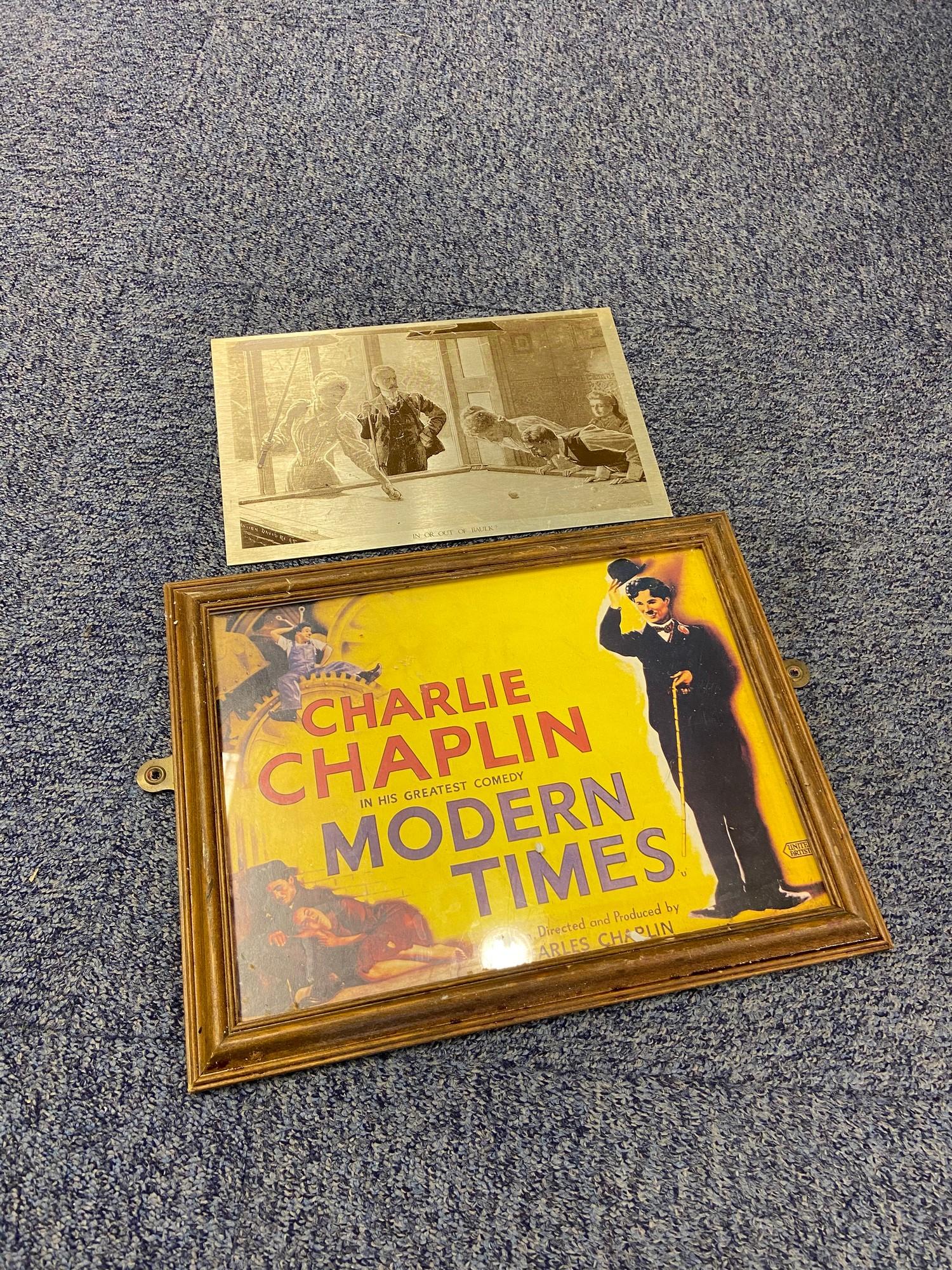 A Charlie Chaplin adverting framed poster and a metal print titled 'IN OR OUT OF BAULK?'