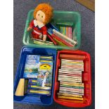 Three boxes of various children's books which includes Enid Blyton novels, Arthur Ransome novels and