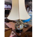 A Large rise and fall design cloisonné table lamp, sat upon a hard wood stand. In a working