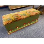 A charming antique hand painted linen chest with material top. Brass handles to the side and a