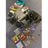 A Selection of various console items which includes a Playstation one with controller and games.