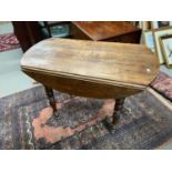 A 19th century drop end lounge table. Designed with turned leg supports.