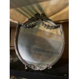 A Regency style plated wreath and ribbon design dressing table mirror.