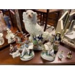 A Collection of 19th century Staffordshire flatbacks and small German figures.