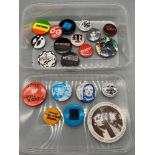 A Quantity of vintage pin badges which include The Madness & U.B.40