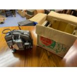 A Vintage Bolex Naillard projector with box and accessories