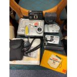A Selection of vintage Kodak cameras and printer.