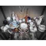 A shelf of Collectables to include China Ware, mona tea set, coalport figure evening at the opera