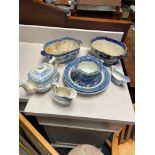 A Lot of 19th century blue and white porcelain wares to include tureens, cream jugs and tea pot.