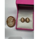 A 9ct gold cameo brooch/ Pendant together with a pair of yellow metal cameo earrings [Unmarked].