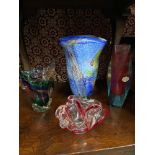 Four various pieces of art glass to include Bohemian red facet cut vase, and three various sized