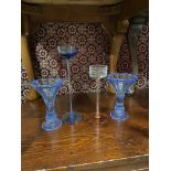 Two art glass Wedgwood candle sticks by Frank Thrower together with a pair of blue art deco glass