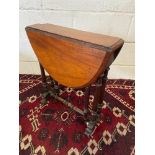 A Victorian period walnut Yacht Table or Sutherland with turned supports. [H:58cm x L:72cm x W:52cm]