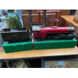 An Impressive Large and heavy metal train locomotive and tender. Electric movement. Comes with