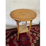 A 19th century bamboo and weaved two tier side table. [H:72CM X W:53CM]