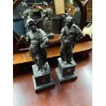 A Pair of Spelter centurions sat upon slate bases. [45CM IN HEIGHT]