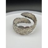 A Far Eastern silver bangle. [36.53grams]