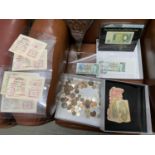 A Selection of mixed coins and various framed, protected and loose bank notes.